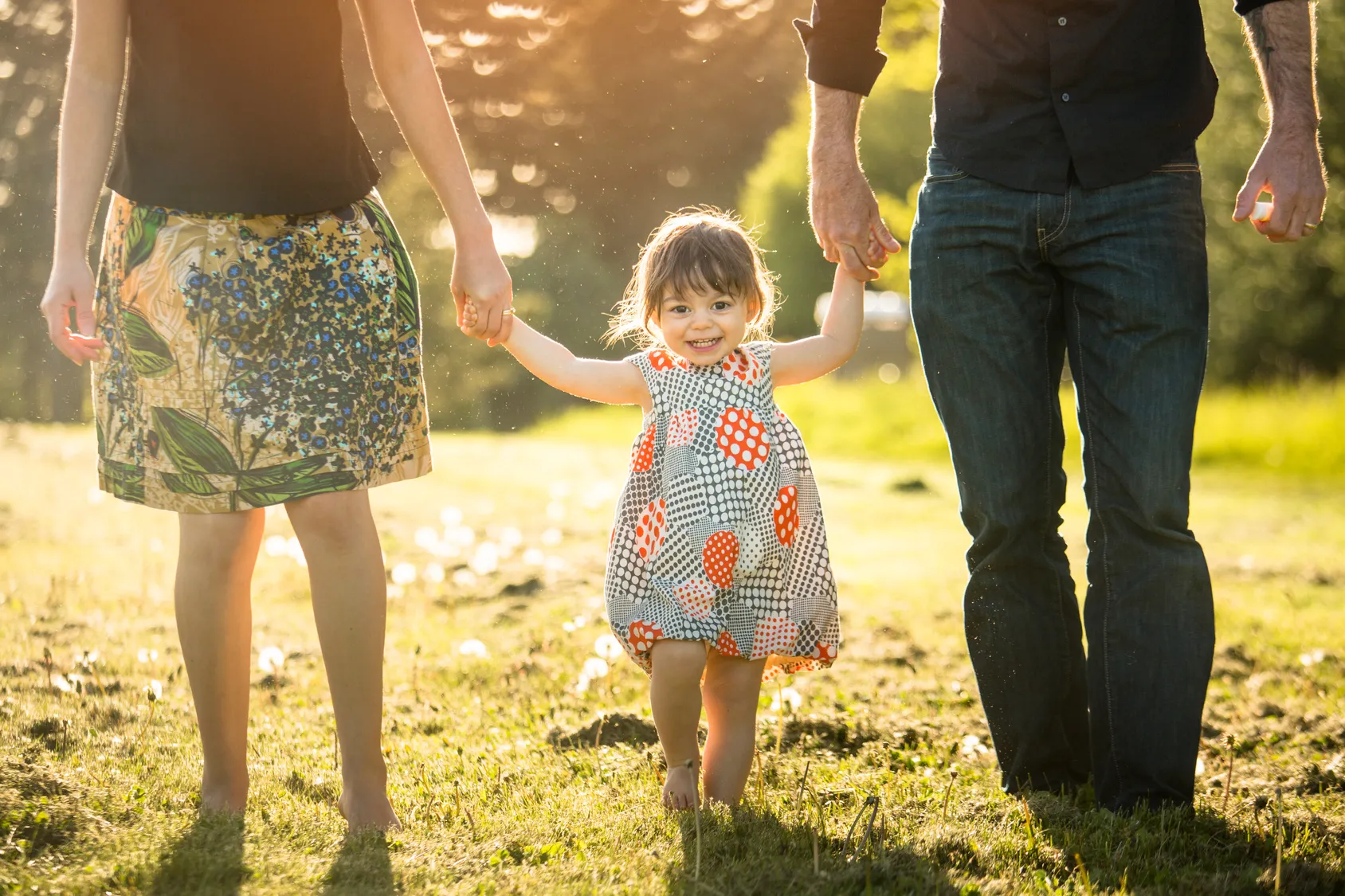 Family holding hands, secure coverage and peace of mind for individuals and families.